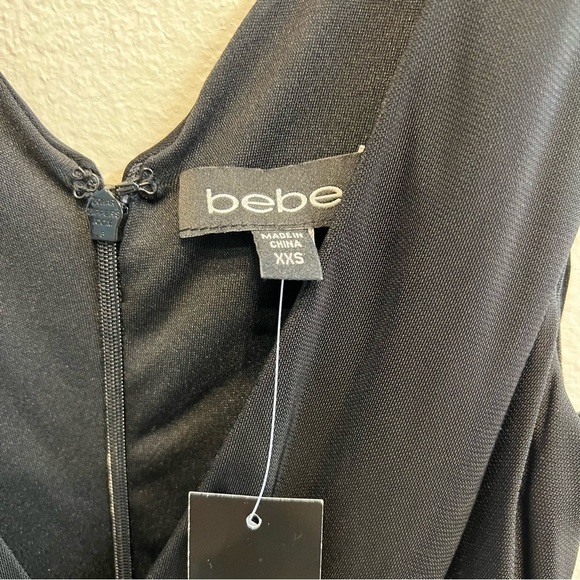 NWT BeBe Vibrant Asymmetrical Draped Dd black Dress. V neckline Size XXS - Picture 12 of 16